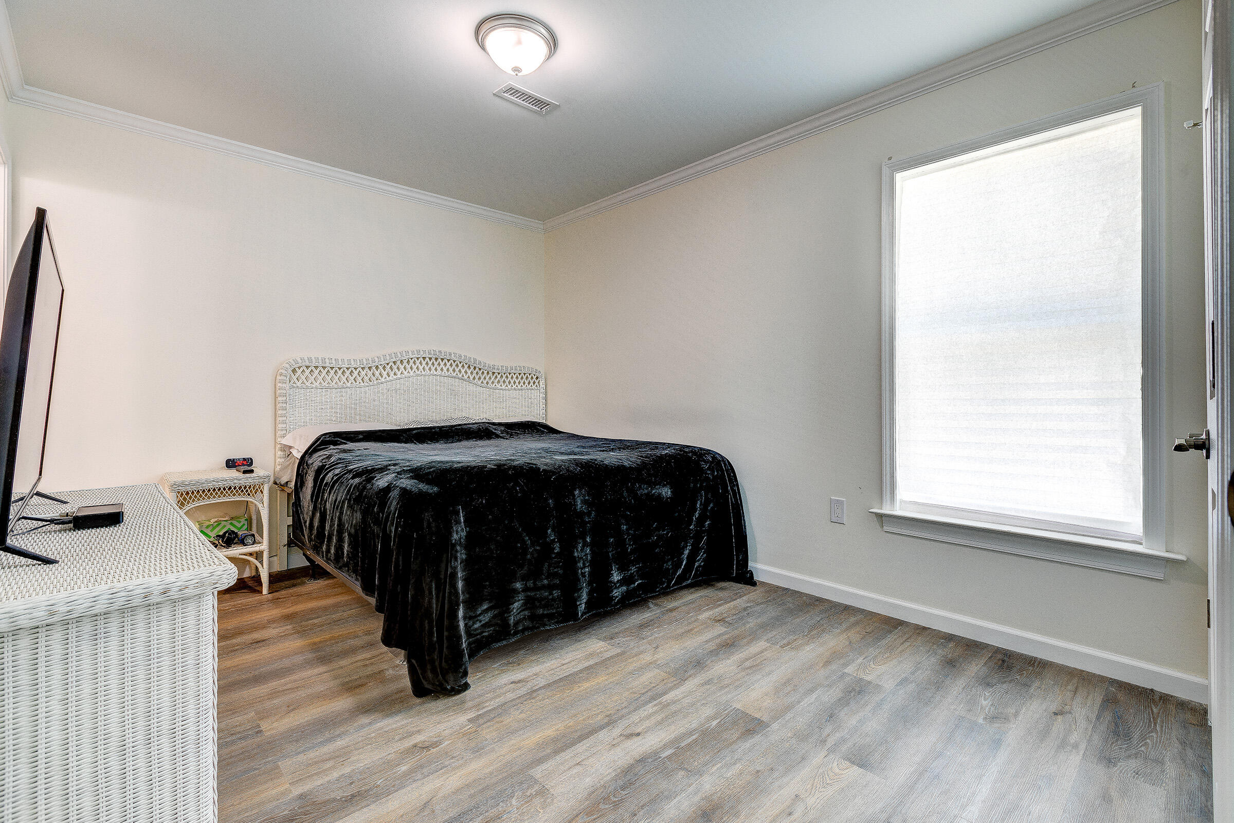 55 Boca Chica Road, Unit 27 Key West, FL 33040 - Photo 12 of 20 a bedroom with a bed and a window