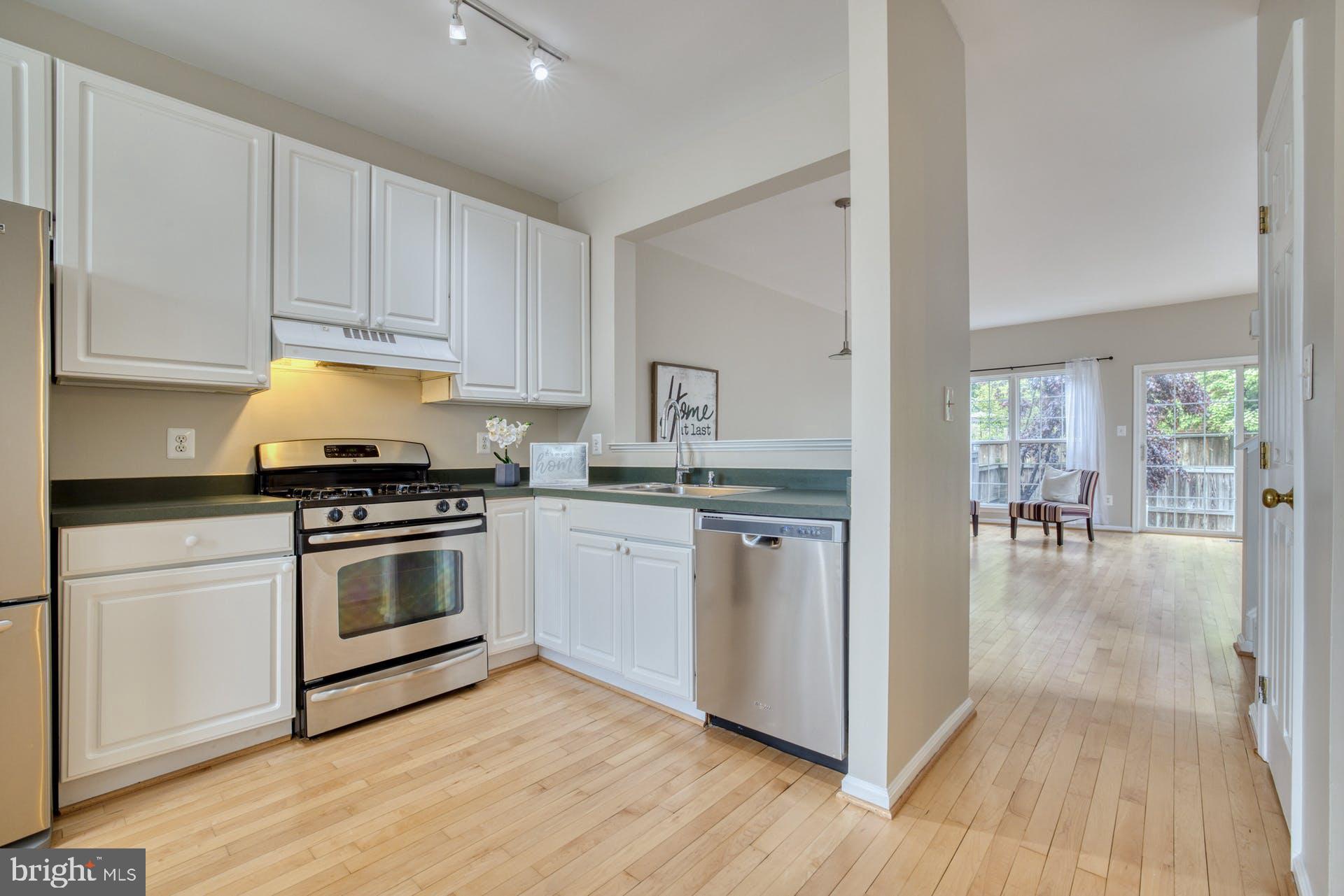 11482 Heritage Commons Way Reston, VA 20194 - Photo 11 of 32 Kitchen open to dining/living room