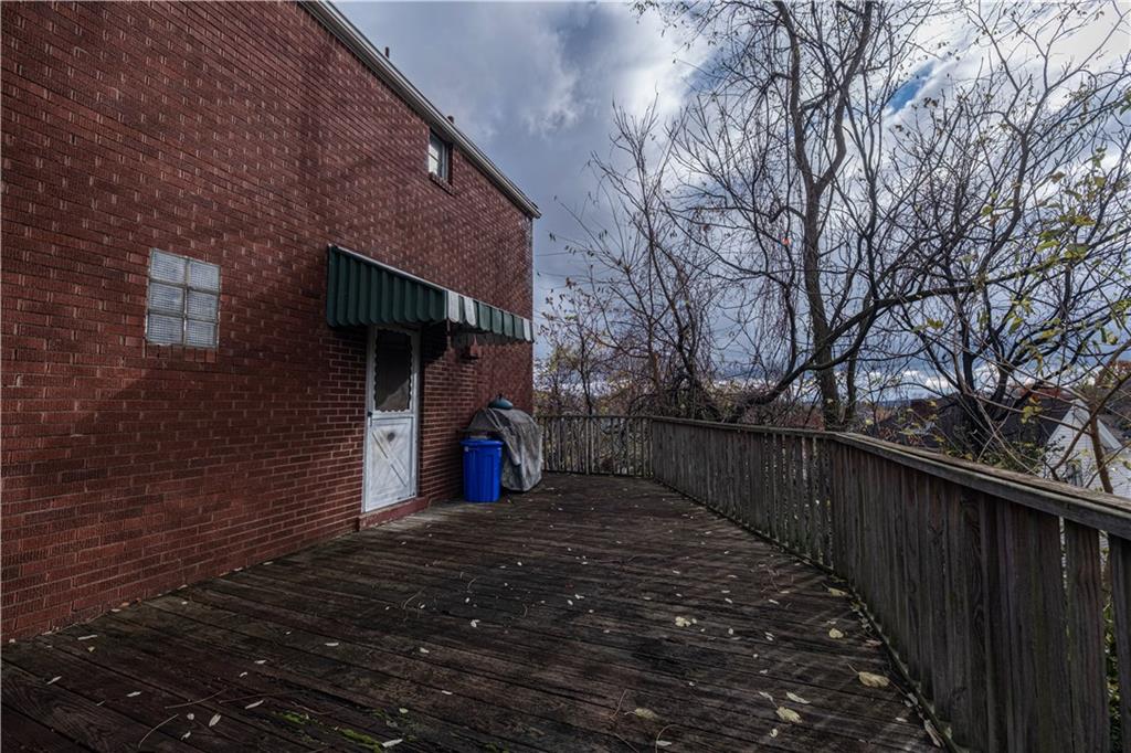 939 Delevan Street Pittsburgh, PA 15217 - Photo 26 of 36 a view of a house with a small yard