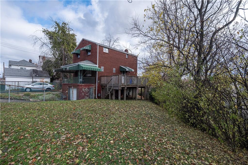 939 Delevan Street Pittsburgh, PA 15217 - Photo 30 of 36 a front view of a house with a yard