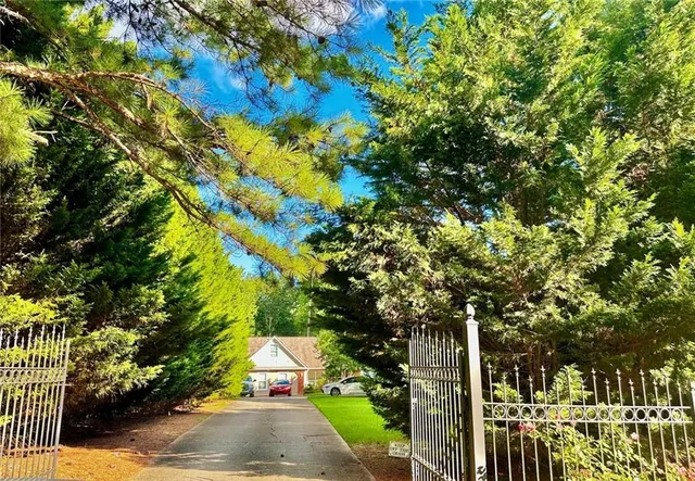 $650,000 | 730 Tab Roberts Road Northwest, Suwanee, GA 30024