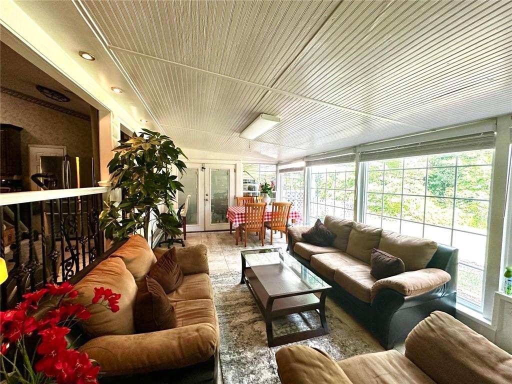 730 Tab Roberts Road Northwest Lawrenceville, GA 30043 - Photo 4 of 6 a living room with furniture and a large window