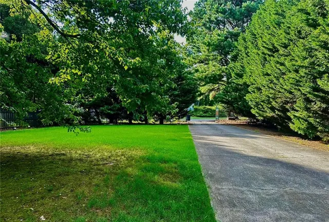 $650,000 | 730 Tab Roberts Road Northwest, Suwanee, GA 30024