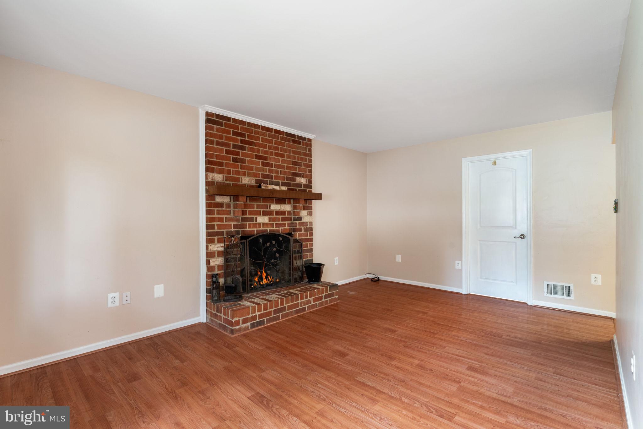 4084 Braxton Road Chantilly, VA 20151 - Photo 16 of 46 Family room with fireplace