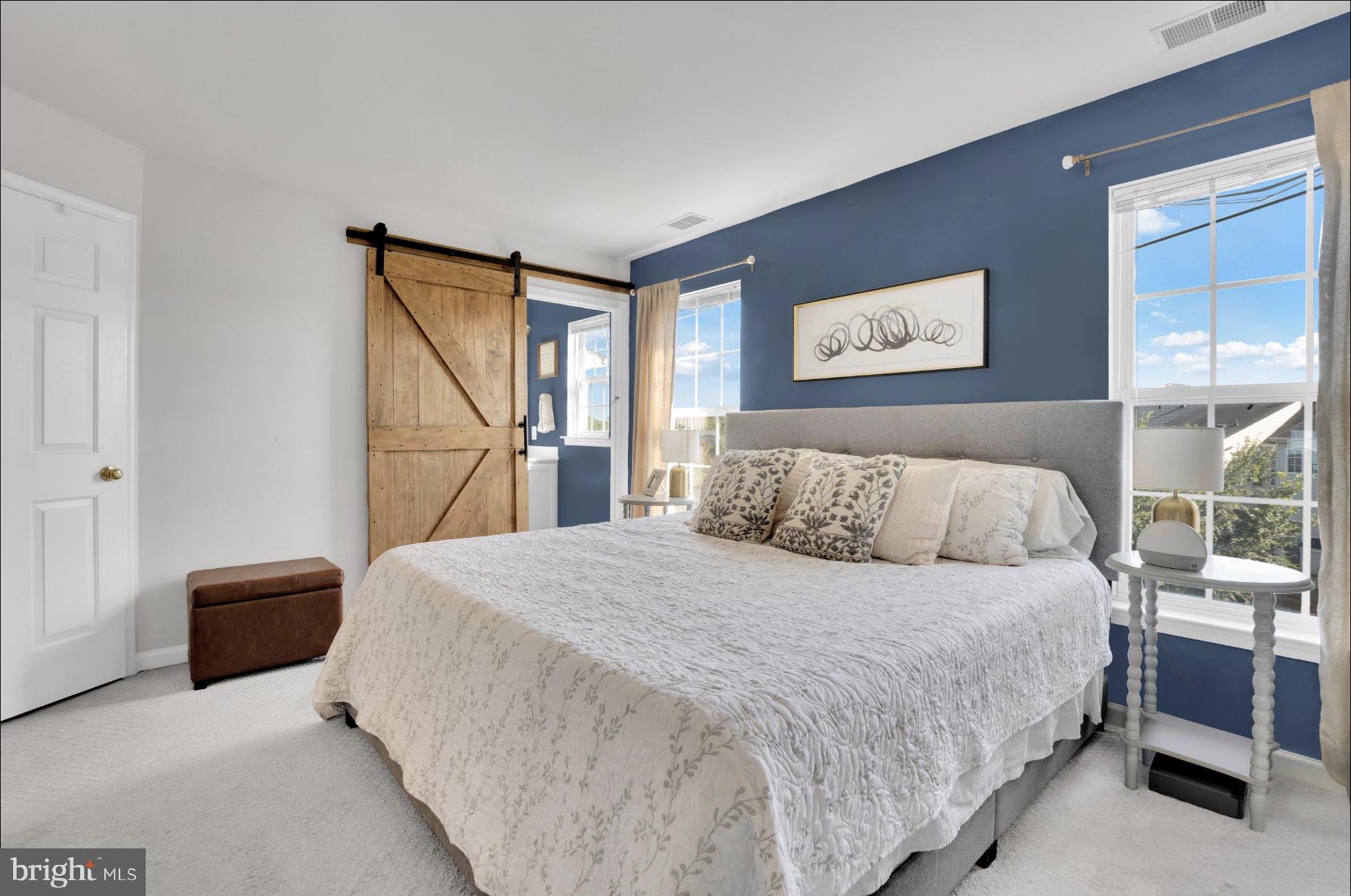 25336 Sweetness Terrace Aldie, VA 20105 - Photo 19 of 33 a bedroom with a bed and a closet