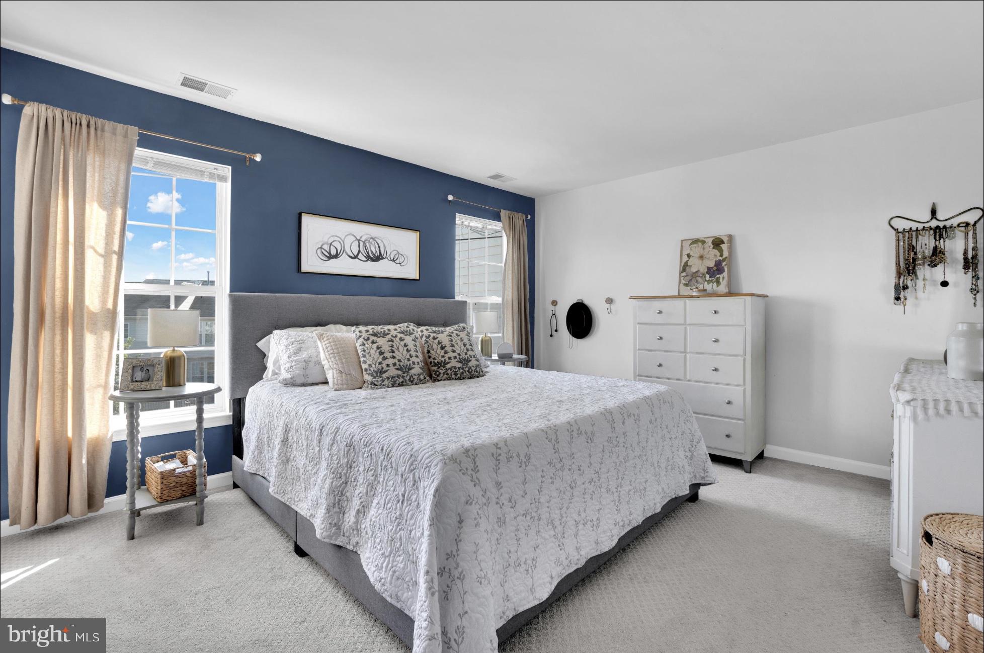 25336 Sweetness Terrace Aldie, VA 20105 - Photo 20 of 33 a spacious bedroom with a bed and a window