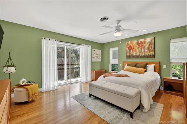 a bedroom with a bed and a sink