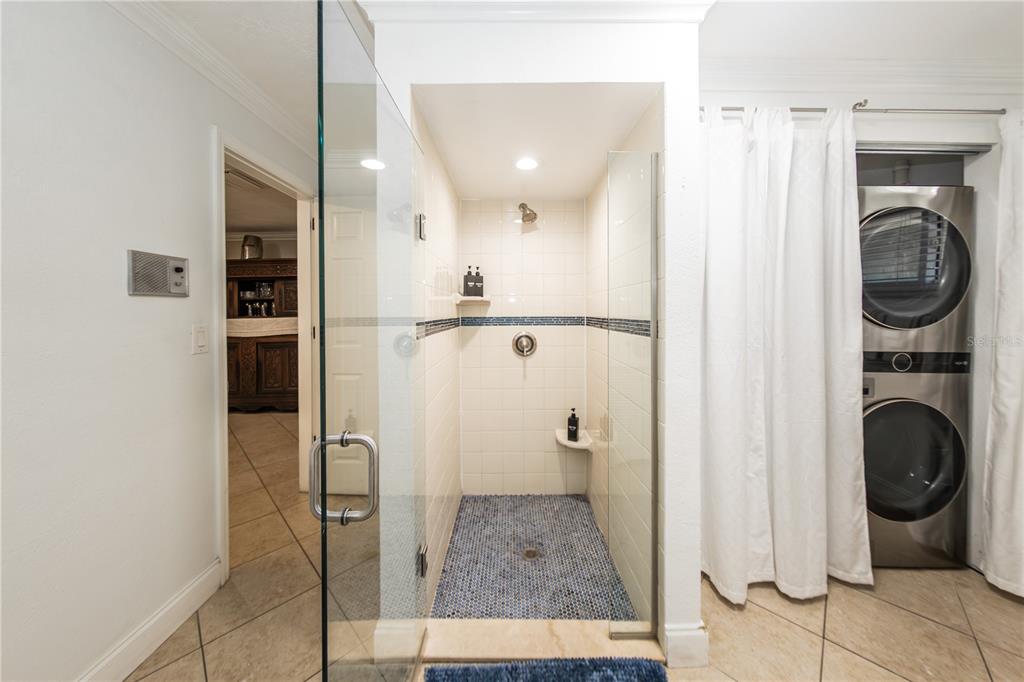 5584 North Dean Road Orlando, FL 32817 - Photo 20 of 39 a view of a hallway with washer and dryer
