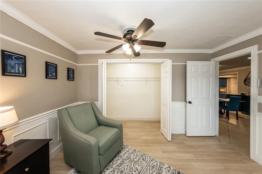 5584 North Dean Road Orlando, FL 32817 - Photo 24 of 39 a living room with furniture and a window