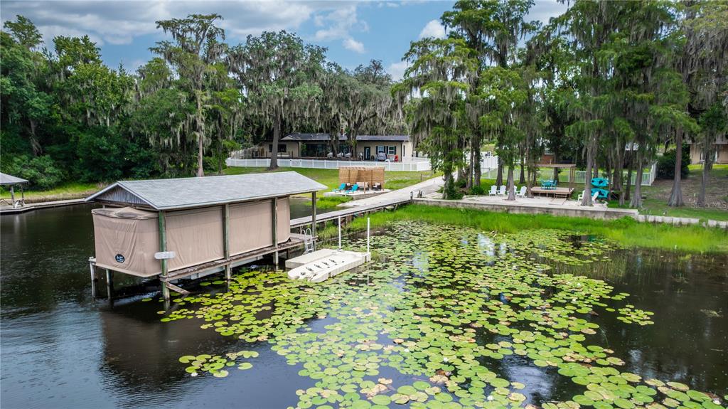 5584 North Dean Road Orlando, FL 32817 - Photo 37 of 39 an aerial view of a house with swimming pool garden and patio