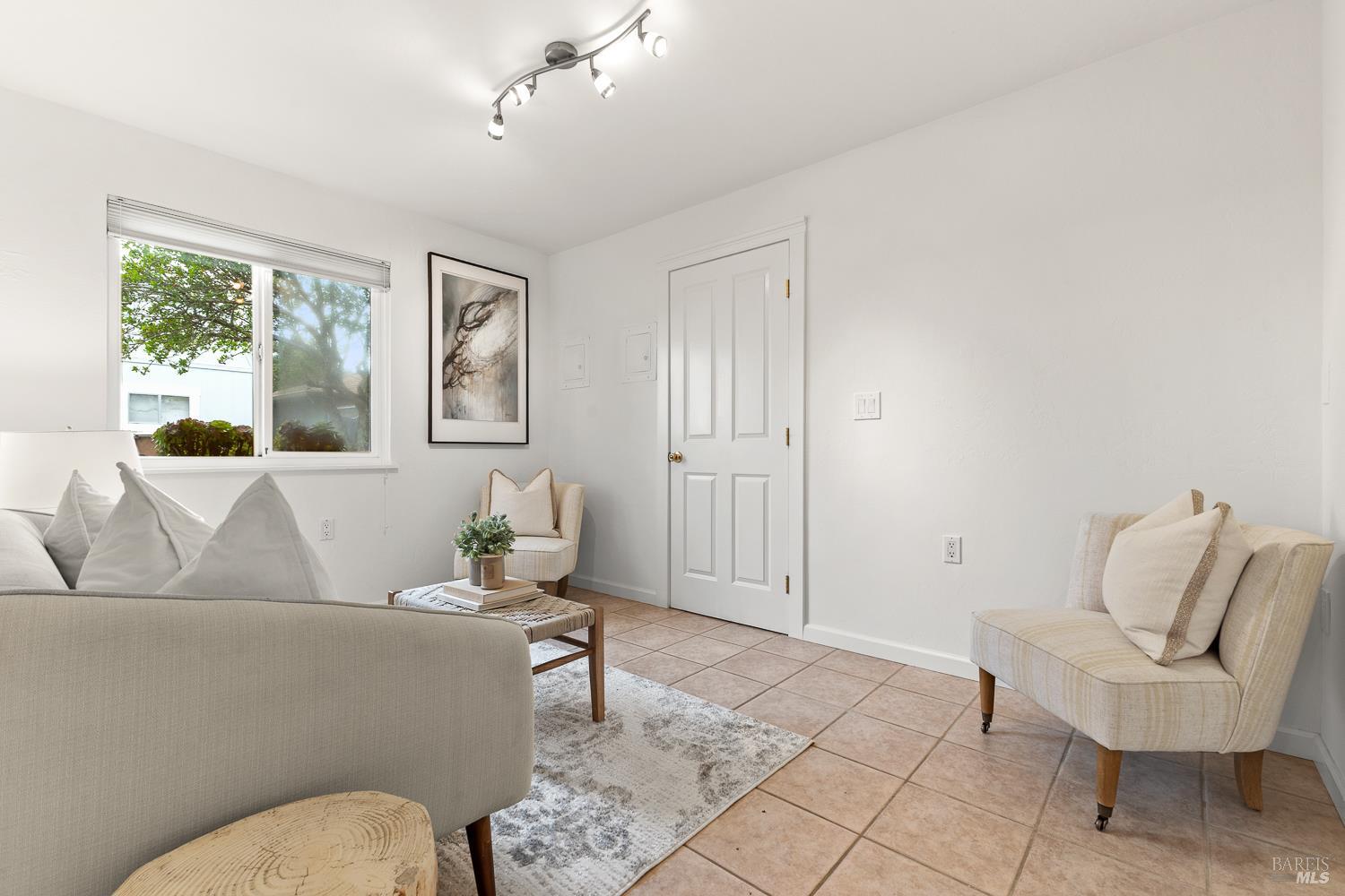 1636 Milton Road Napa, CA 94559 - Photo 22 of 66 Lower level sitting room or home office with a large closet.