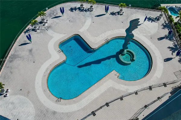an aerial view of a swimming pool