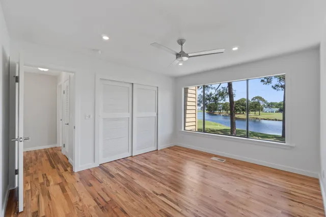 a bathroom with 2 sink and a mirror