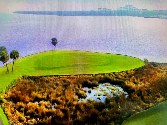 a view of balcony and yard