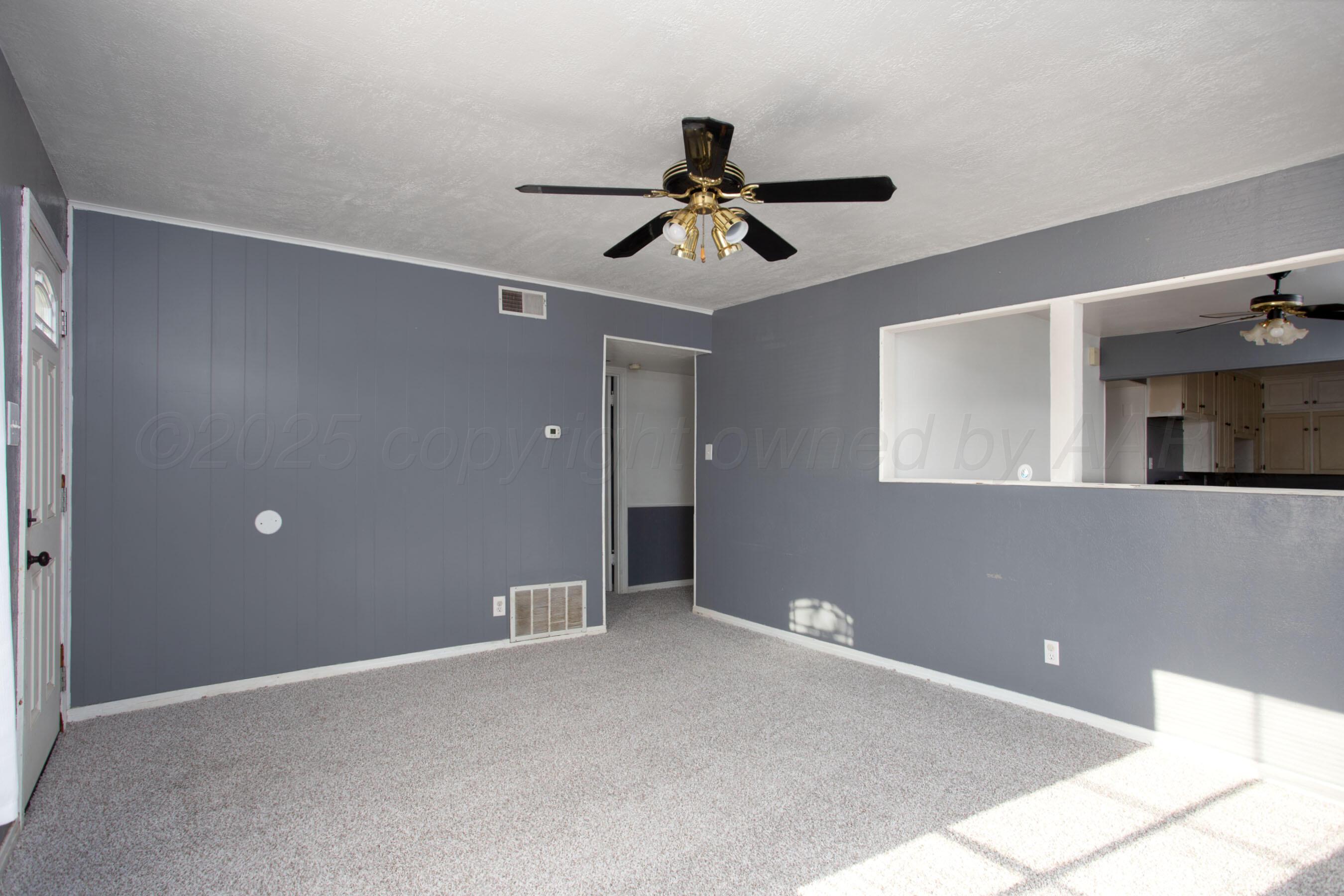 4630 South Hayden Street Amarillo, TX 79110 - Photo 5 of 26 a view of an empty room