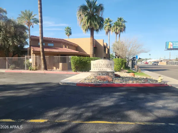 a view of street with houses