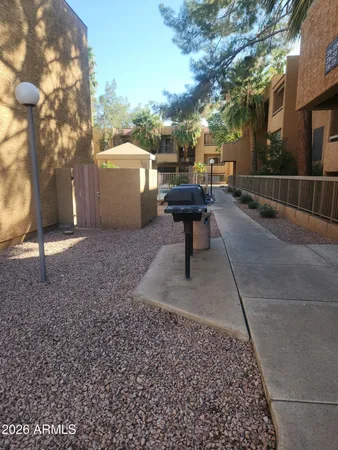 a view of a terrace with sitting area