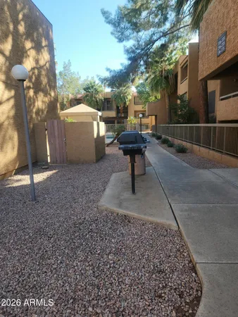 a view of a terrace with sitting area