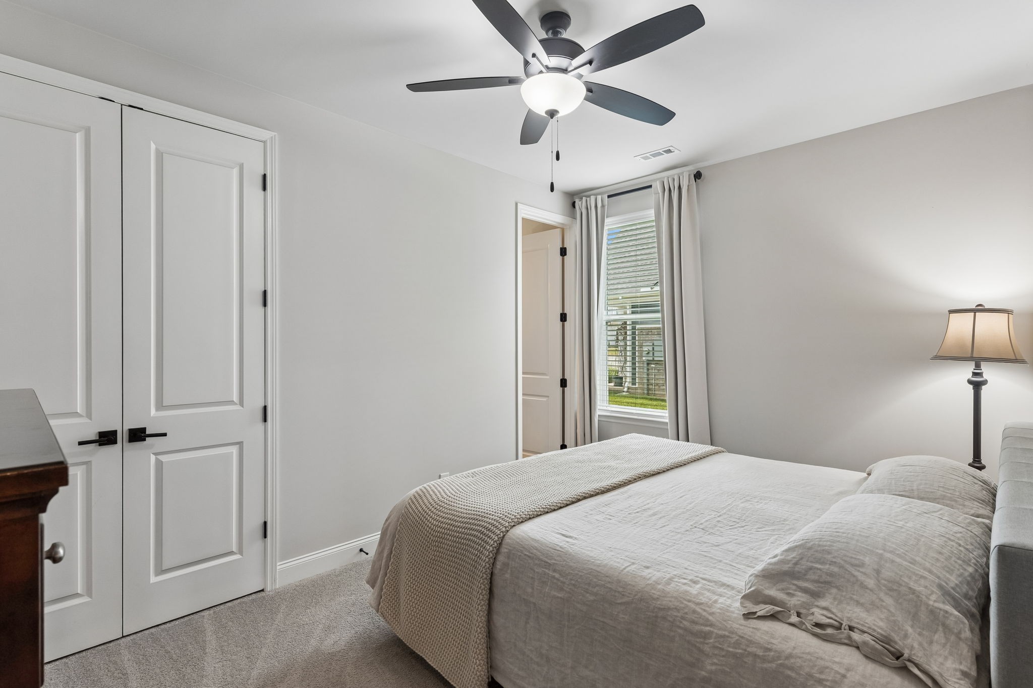 4004 John Marsh Rd Spring Hill Spring Hill, TN 37174 - Photo 11 of 21 a bedroom with a bed and a lamp