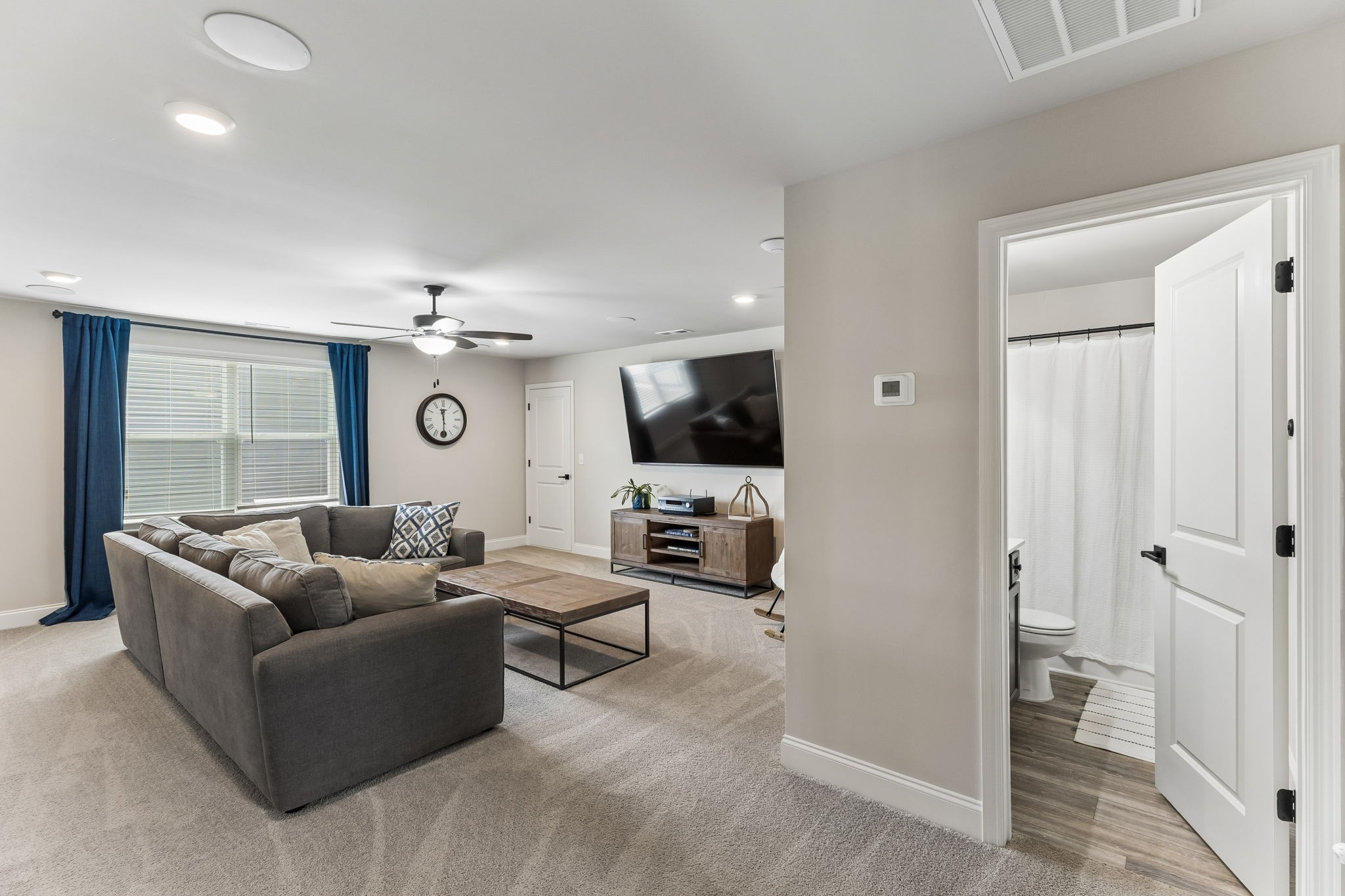 4004 John Marsh Rd Spring Hill Spring Hill, TN 37174 - Photo 13 of 21 a living room with furniture and a flat screen tv