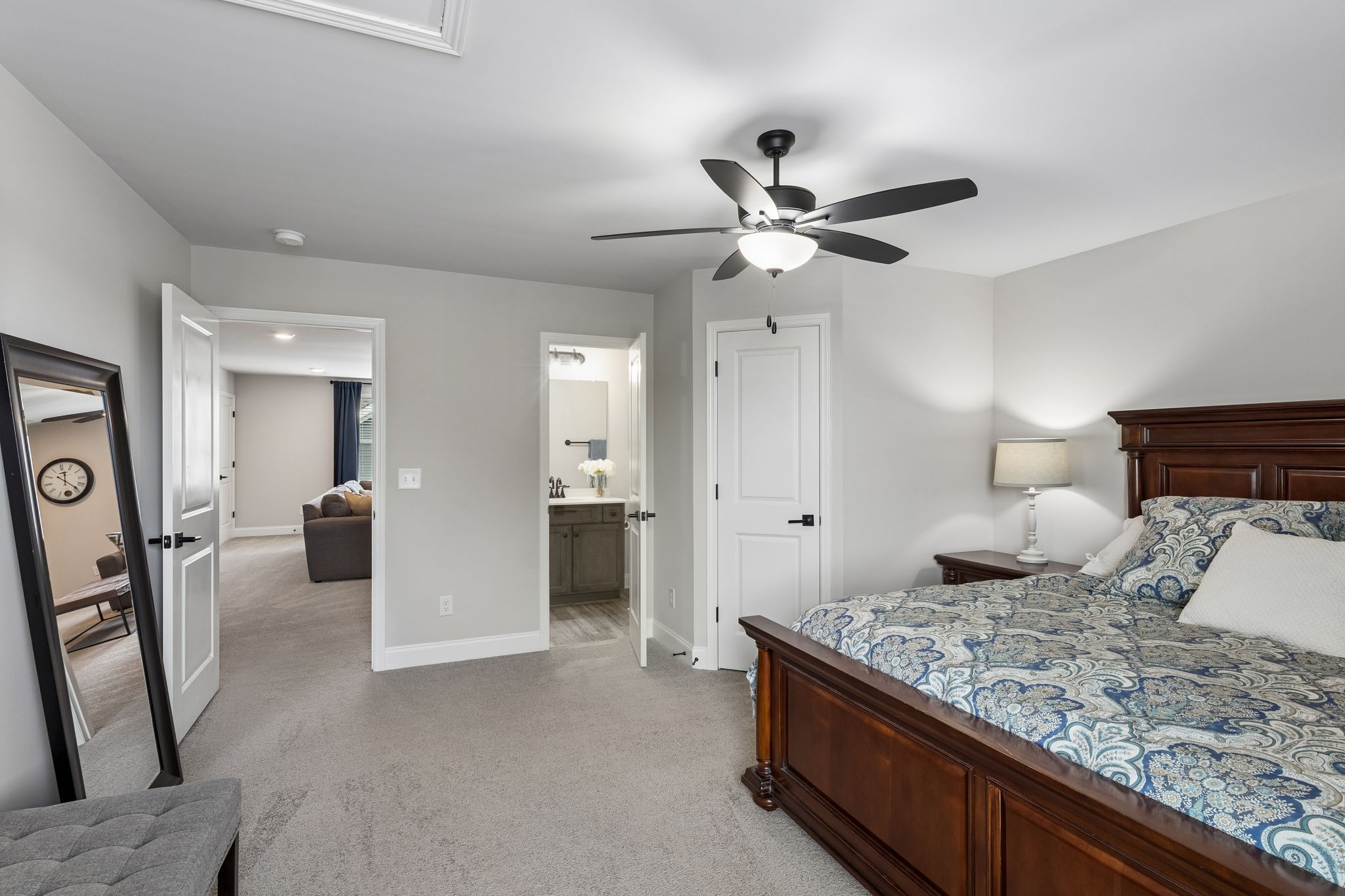 4004 John Marsh Rd Spring Hill Spring Hill, TN 37174 - Photo 14 of 21 a bedroom with a large bed and a chandelier