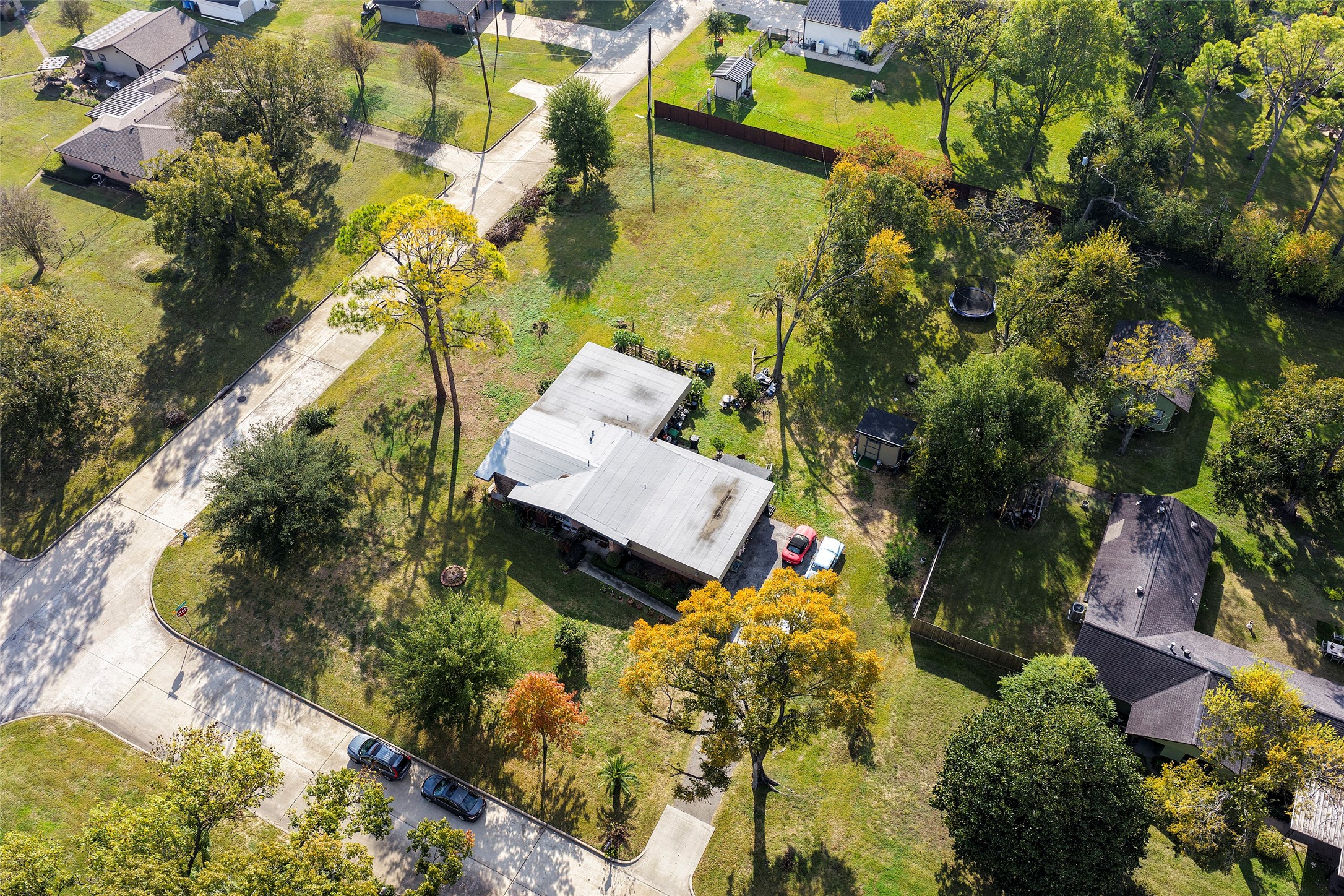 9217 Sequoia Drive Houston, TX 77041 - Photo 7 of 8 an aerial view of residential house with swimming pool and lawn chairs