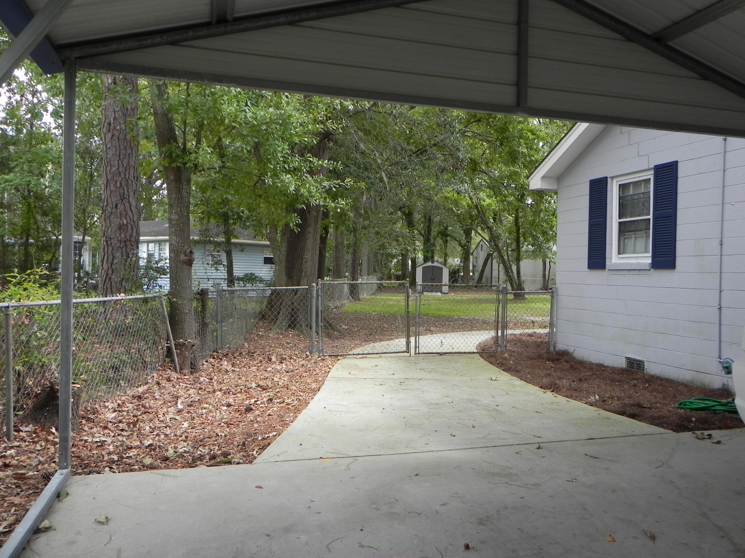 1829 Old Parsonage Road Charleston, SC 29414 - Photo 40 of 45 Drive gate with concrete path