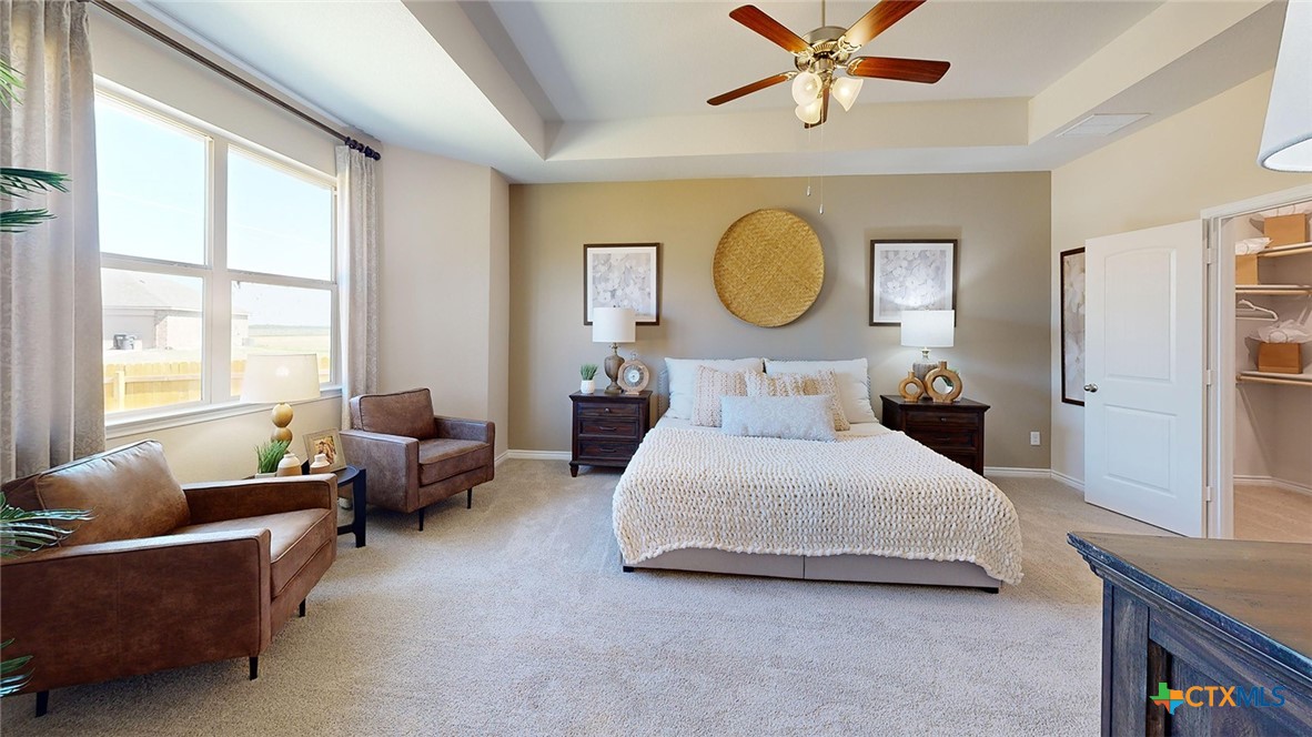 14096 Carsten Loop Salado, TX 76571 - Photo 15 of 32 a bedroom with bed couch and window