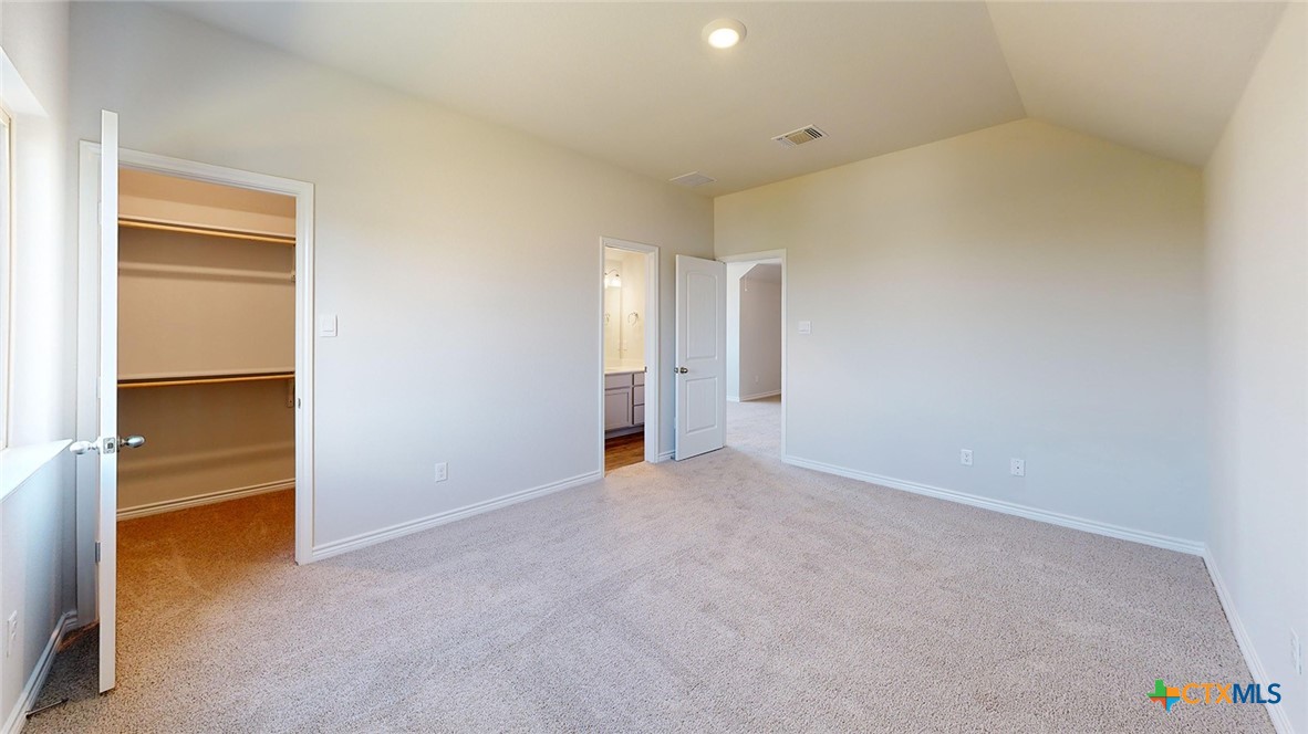 14096 Carsten Loop Salado, TX 76571 - Photo 26 of 32 a view of an empty room with closet and a window