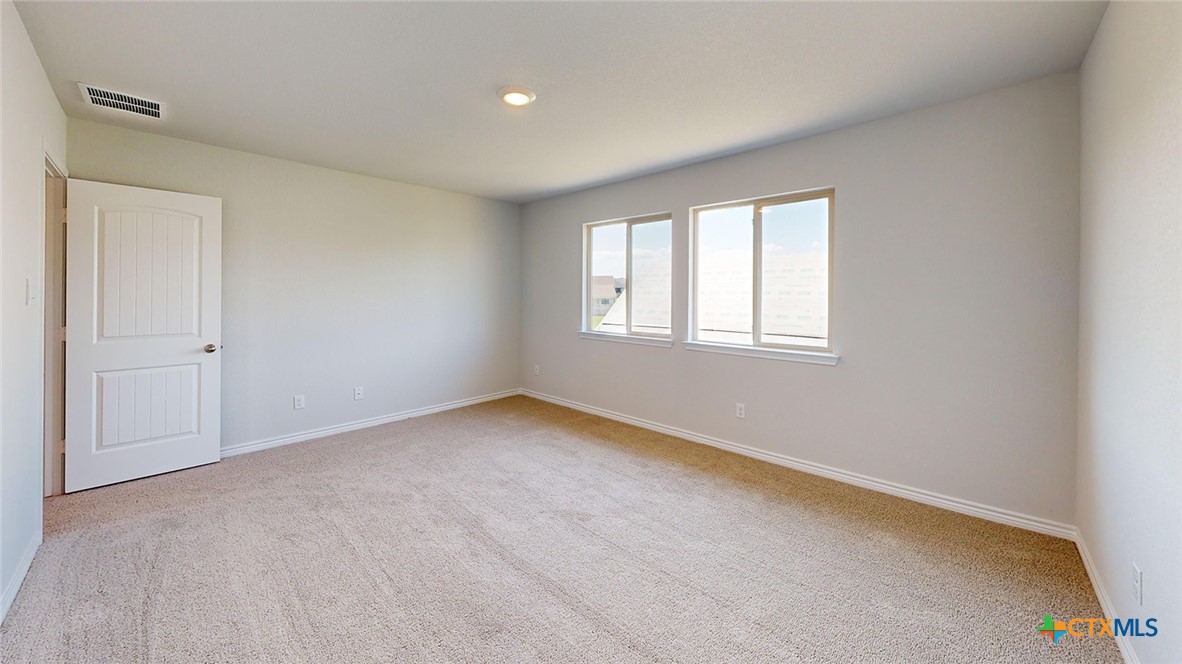 14096 Carsten Loop Salado, TX 76571 - Photo 27 of 32 an empty room with windows