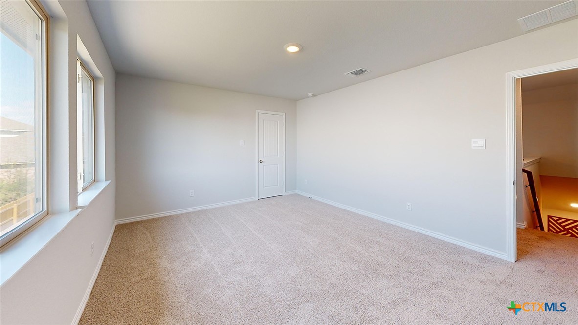14096 Carsten Loop Salado, TX 76571 - Photo 28 of 32 a view of an empty room with a window