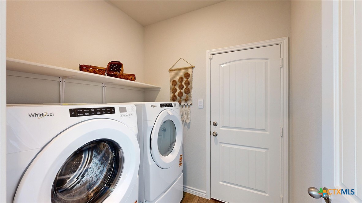 14096 Carsten Loop Salado, TX 76571 - Photo 32 of 32 a view of a storage & utility room with dryer and washer