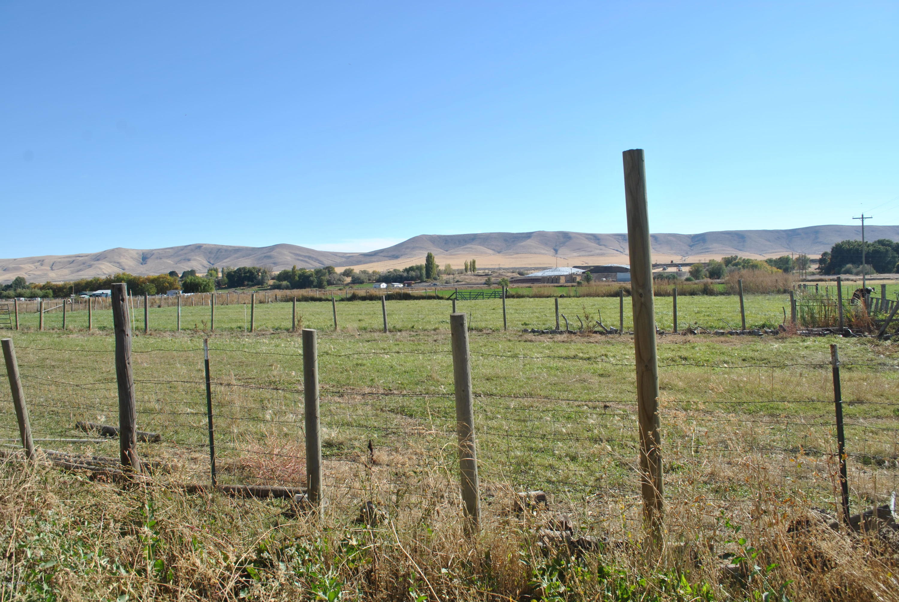 Sr-22 Bus Road Mabton, WA 98935 - Photo 12 of 15 a view of a lake with a big yard