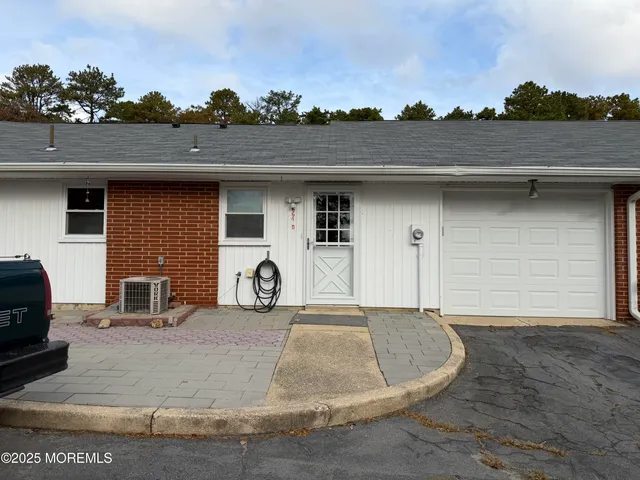 a house view with a outdoor space