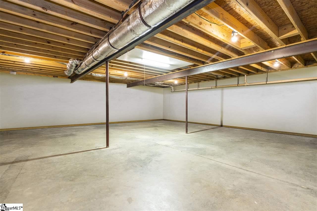 315 Amberleaf Way Simpsonville, SC 29681 - Photo 18 of 28 This unfinished walkout basement has so many possibilities! The basement currently does not have drywall installed.