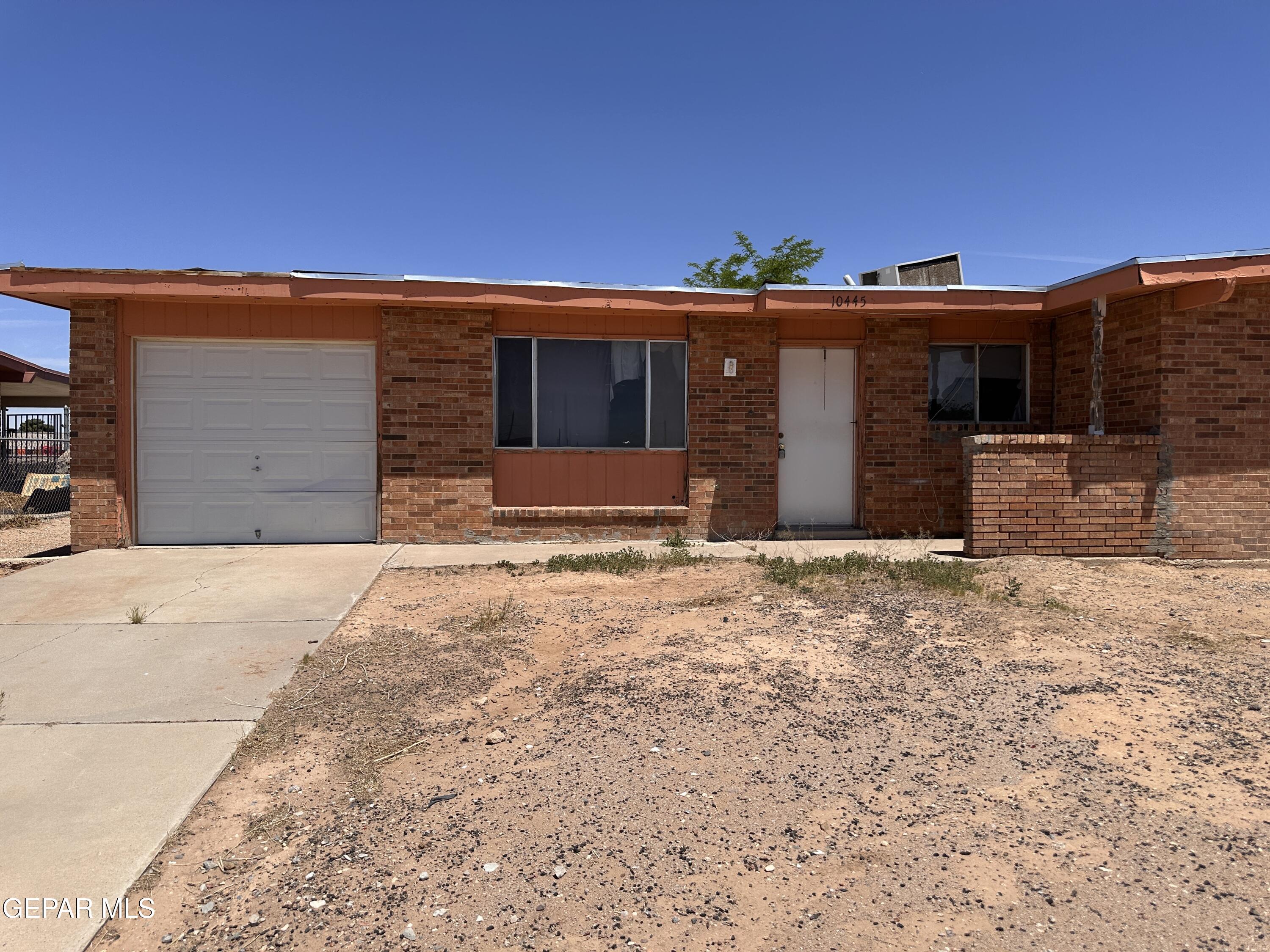 10445 Omega Circle El Paso, TX 79924 - Photo 6 of 6 a view of a house with a yard