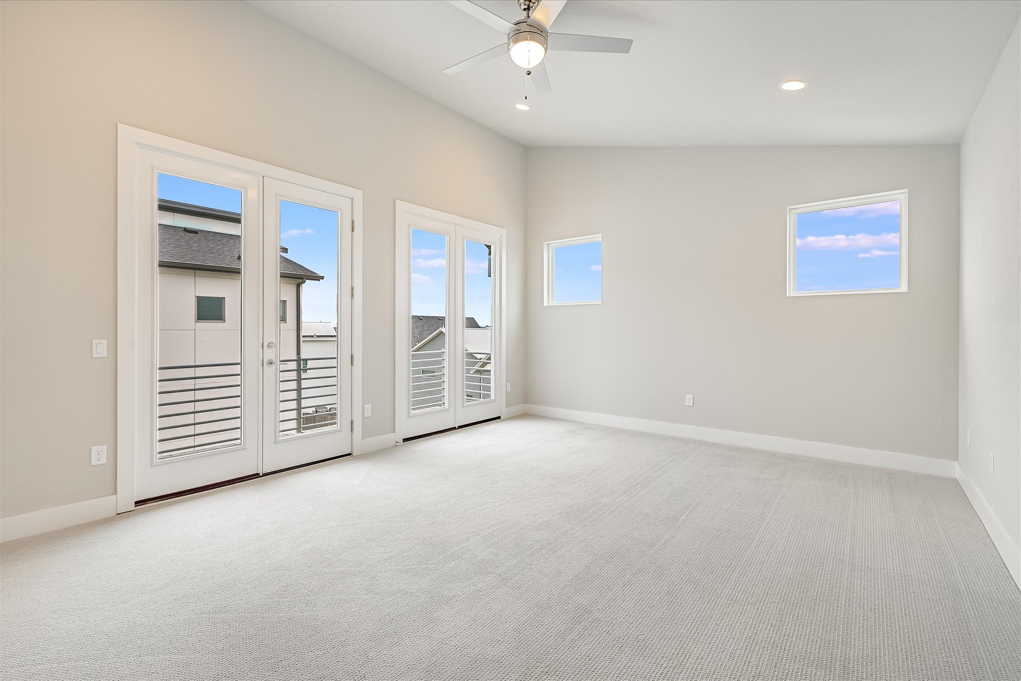 6136 Florencia Lane Austin, TX 78724 - Photo 10 of 40 Large Primary Bedroom with Balcony to Enjoy Downtown Views