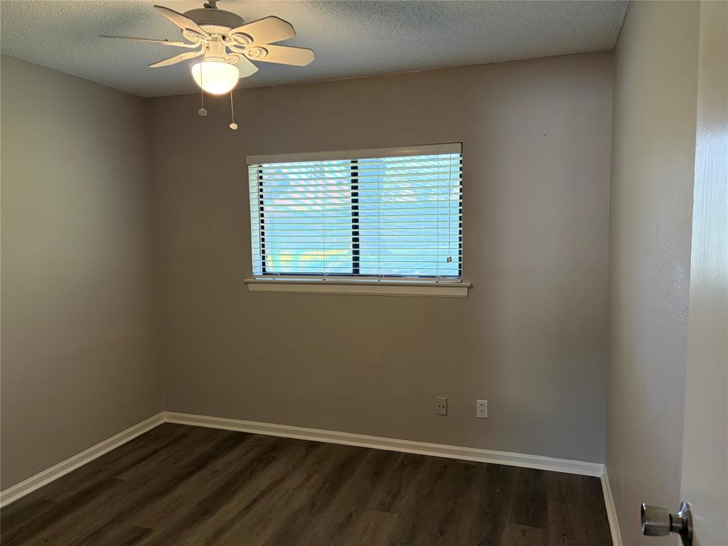 112 Cinnamon Lane Euless, TX 76039 - Photo 6 of 12 an empty room with a window