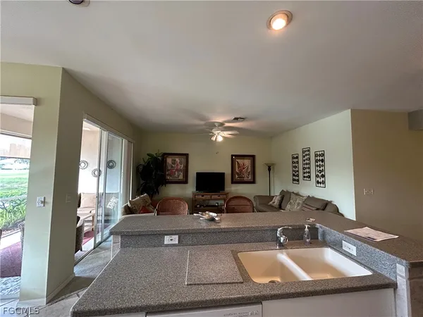 a view of a living room and dining room