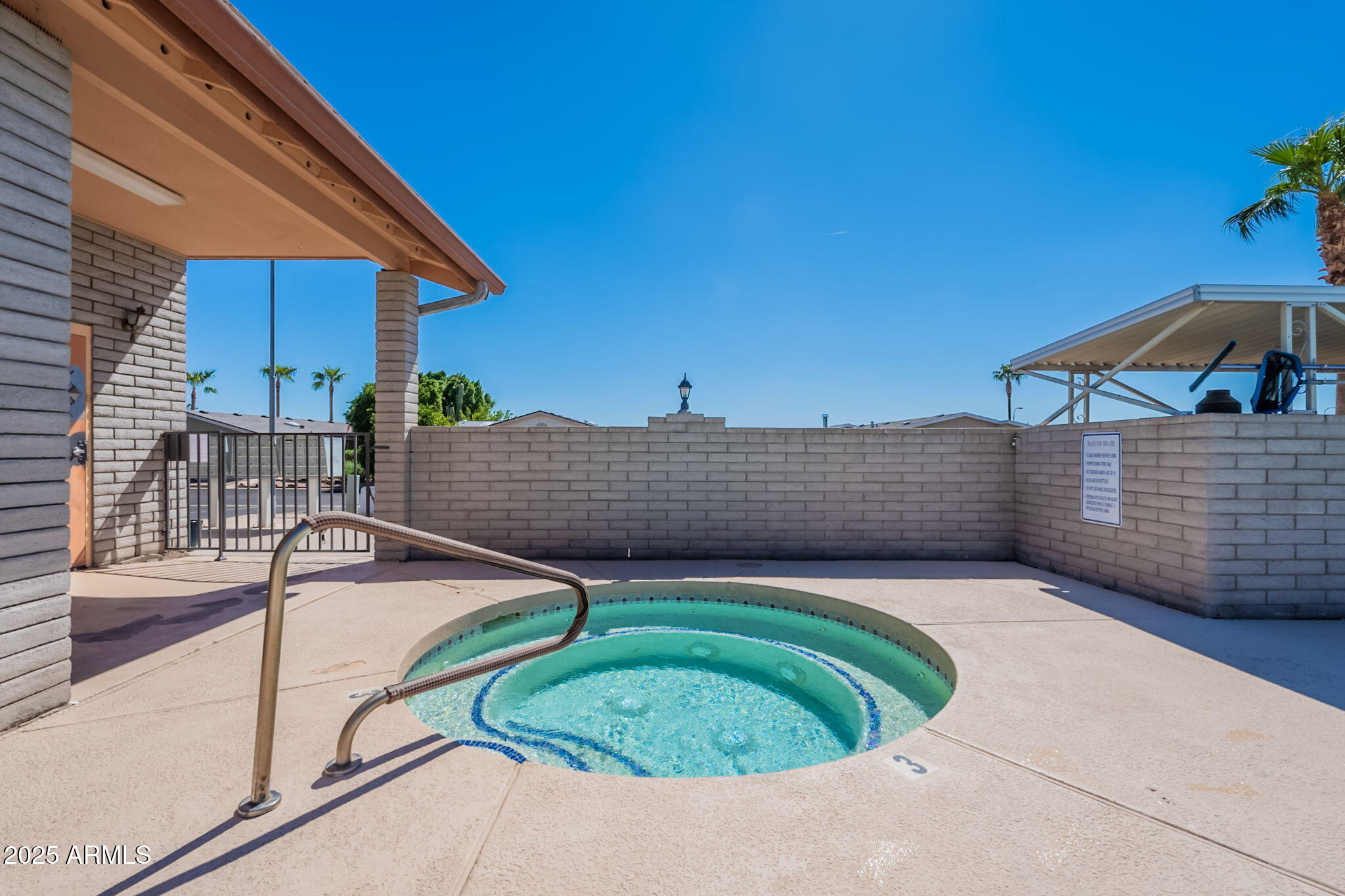 3700 South Tomahawk Road, Unit 39 Apache Junction, AZ 85119 - Photo 41 of 53 a view of a backyard with a patio