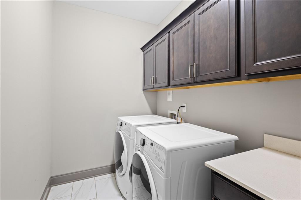 1802 Stephanie Trail Northeast Atlanta, GA 30329 - Photo 13 of 25 a utility room with dryer and washer