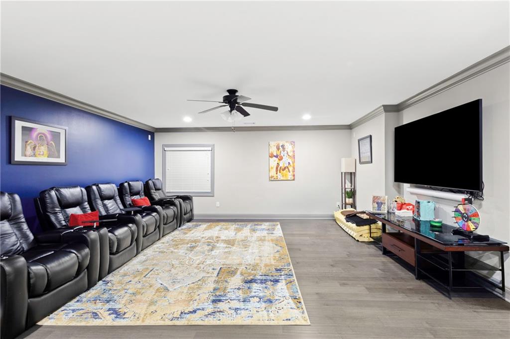 1802 Stephanie Trail Northeast Atlanta, GA 30329 - Photo 18 of 25 a living room with furniture and a flat screen tv