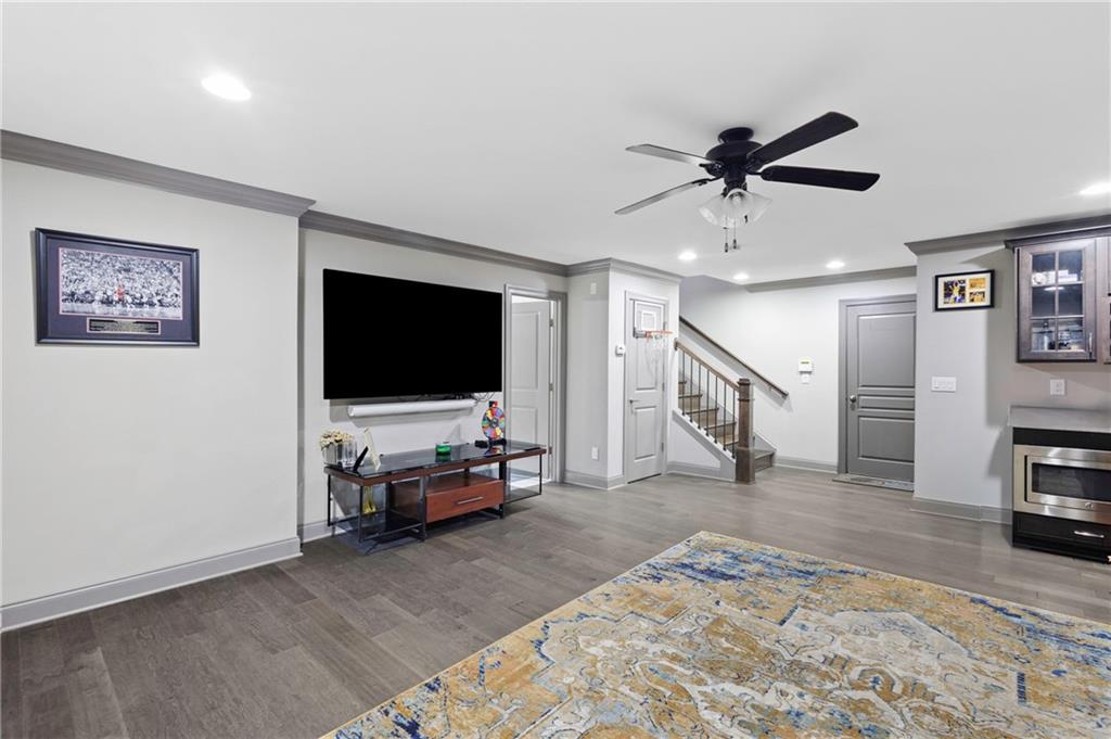 1802 Stephanie Trail Northeast Atlanta, GA 30329 - Photo 19 of 25 a view of a livingroom with furniture and a flat screen tv