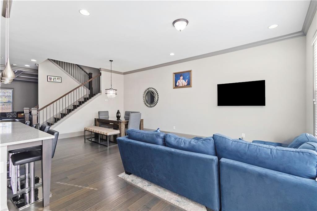 1802 Stephanie Trail Northeast Atlanta, GA 30329 - Photo 7 of 25 a living room with furniture and a flat screen tv