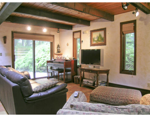 49 Campbell Road Wayland, MA 01778 - Photo 13 of 15 a living room with furniture and a flat screen tv