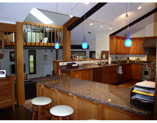 49 Campbell Road Wayland, MA 01778 - Photo 3 of 15 a kitchen with stainless steel appliances granite countertop a sink a stove and a refrigerator
