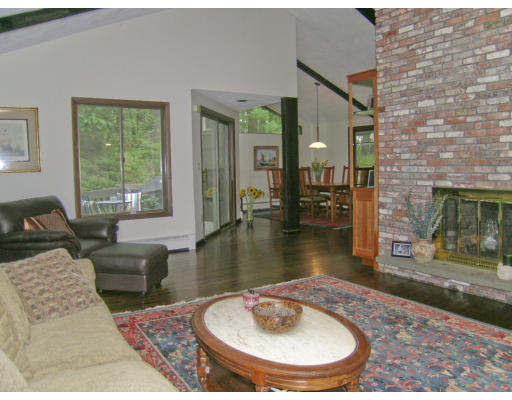 49 Campbell Road Wayland, MA 01778 - Photo 5 of 15 a living room with furniture and a fireplace