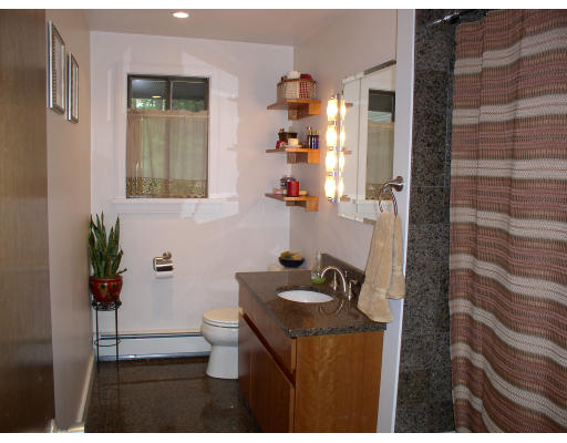 49 Campbell Road Wayland, MA 01778 - Photo 6 of 15 a bathroom with a sink toilet and shower