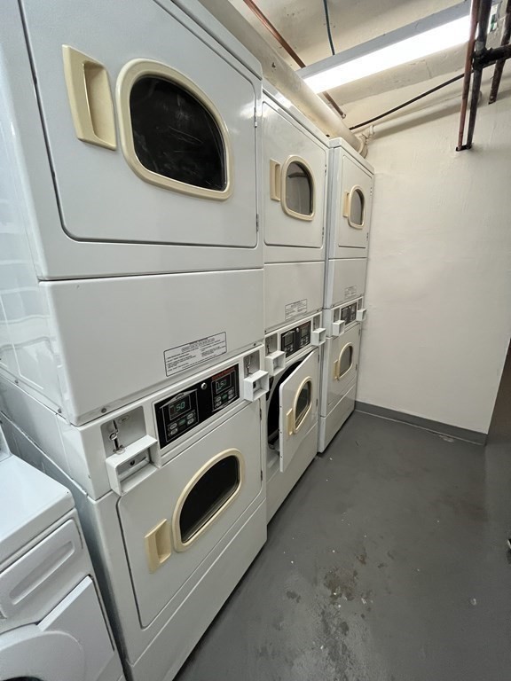 1666 Commonwealth Avenue, Unit 24 Boston, MA 02135 - Photo 15 of 16 a utility room with dryer and washer