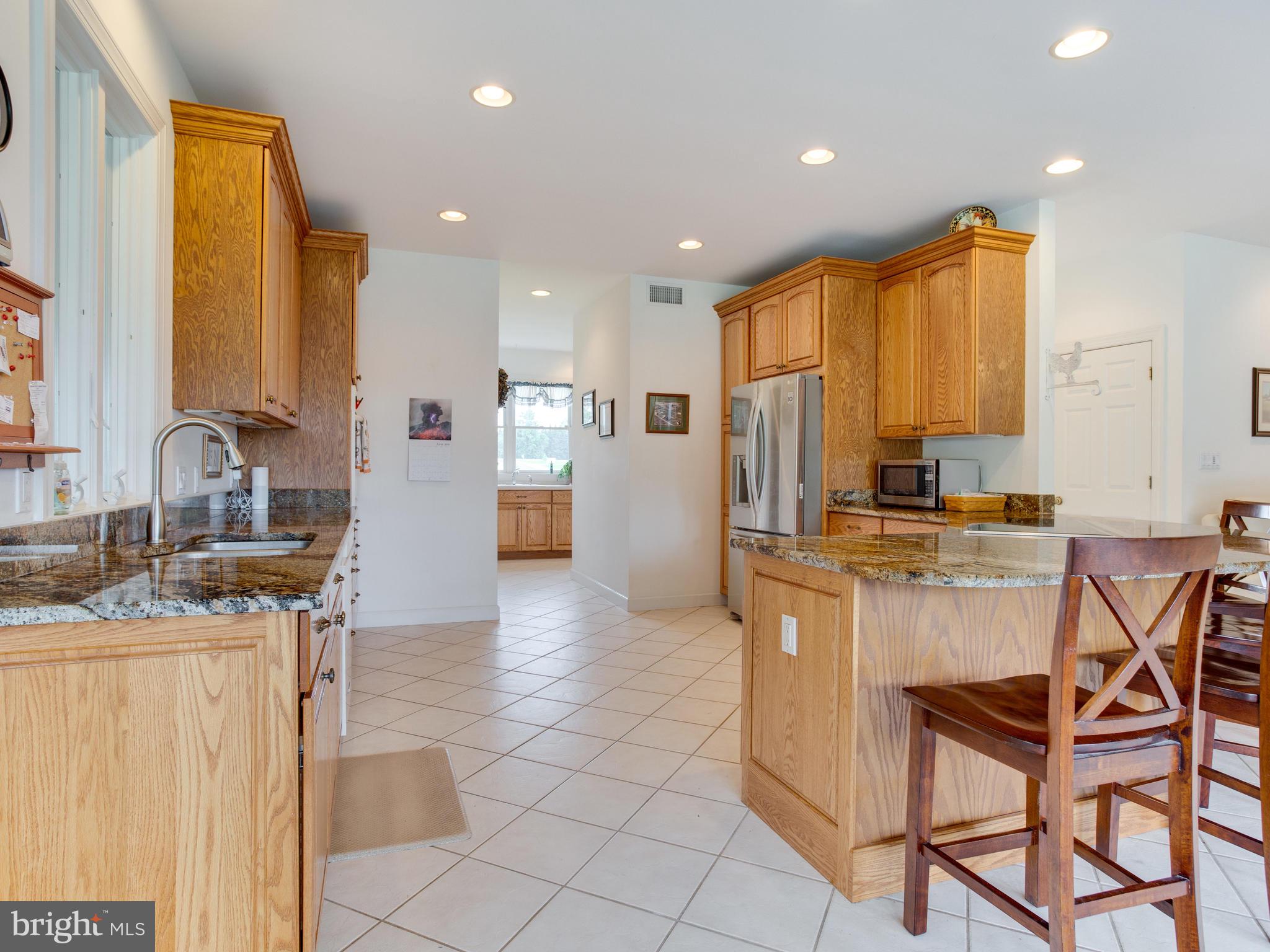 5970 Little Road Lothian, MD 20711 - Photo 15 of 60 Gorgeous Granite wraps around to Large Kitchen